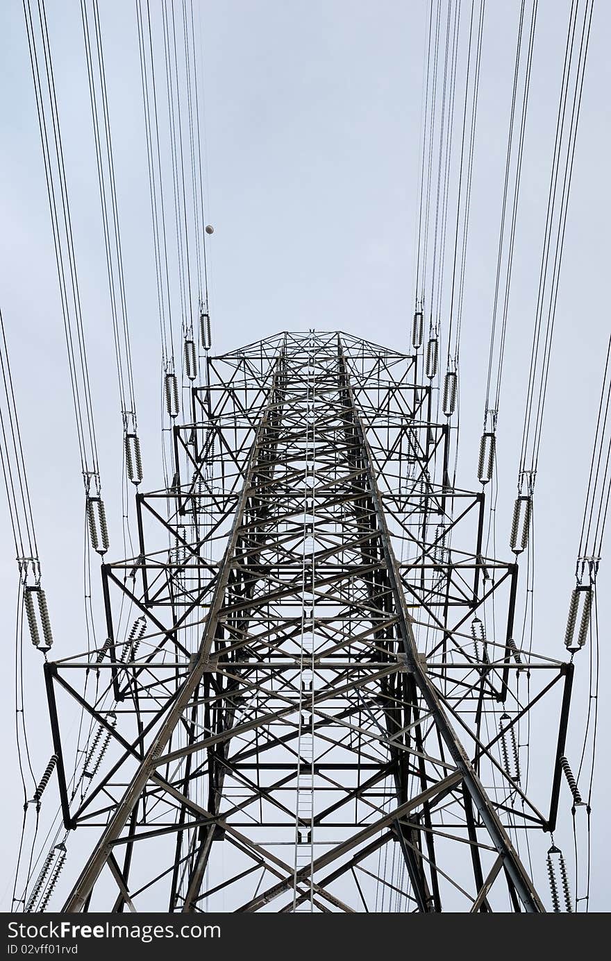 Electric high voltage post with the sky background