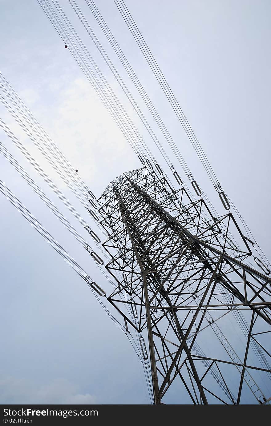 Electric high voltage post with the sky background