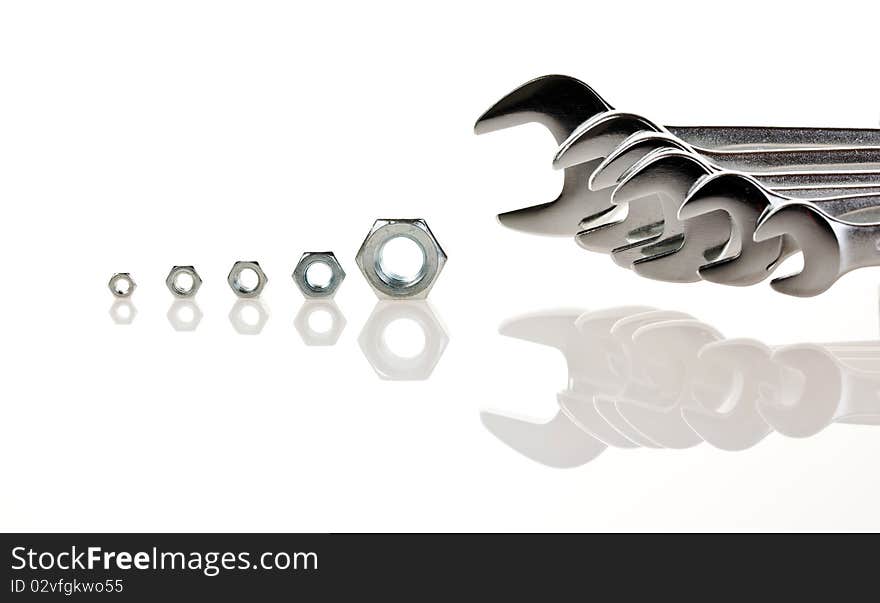 Spanners with nuts isolated on a white background