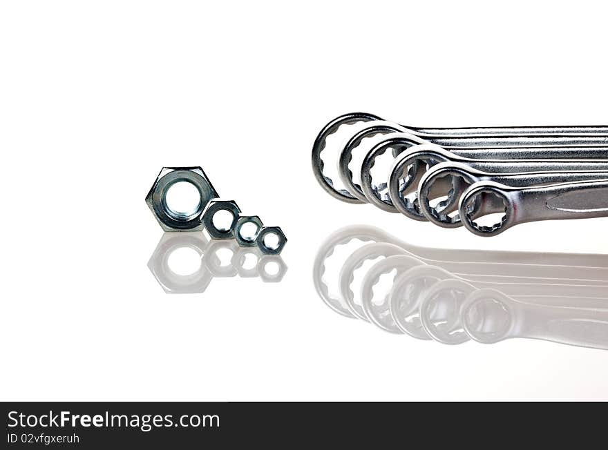 Spanners with nuts isolated on a white background