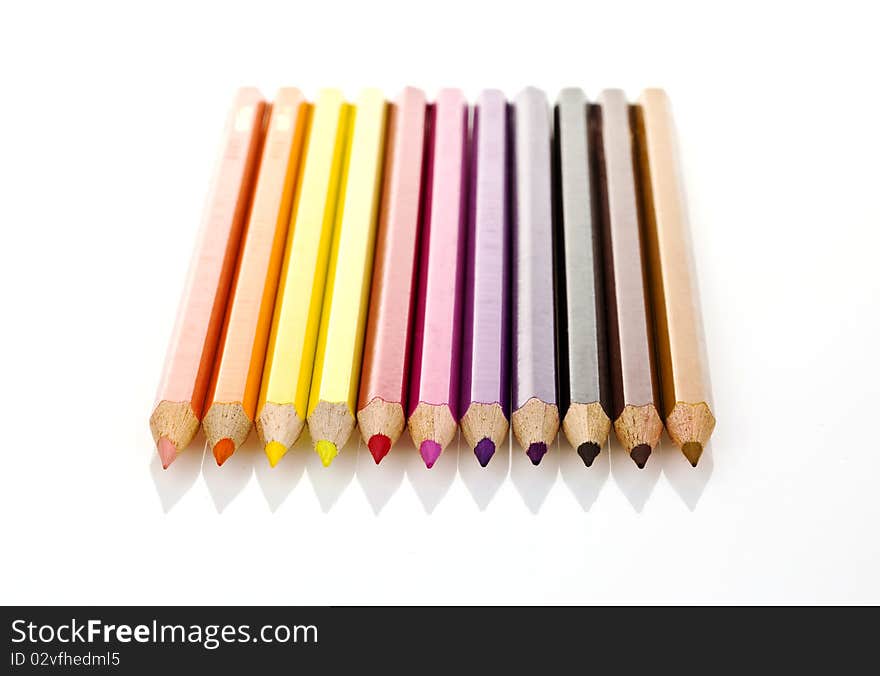 Colored pencils isolated on a white background