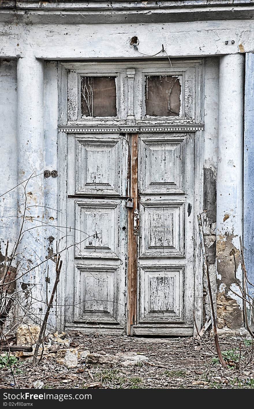 Closed entrance of an old abandoned house. Closed entrance of an old abandoned house