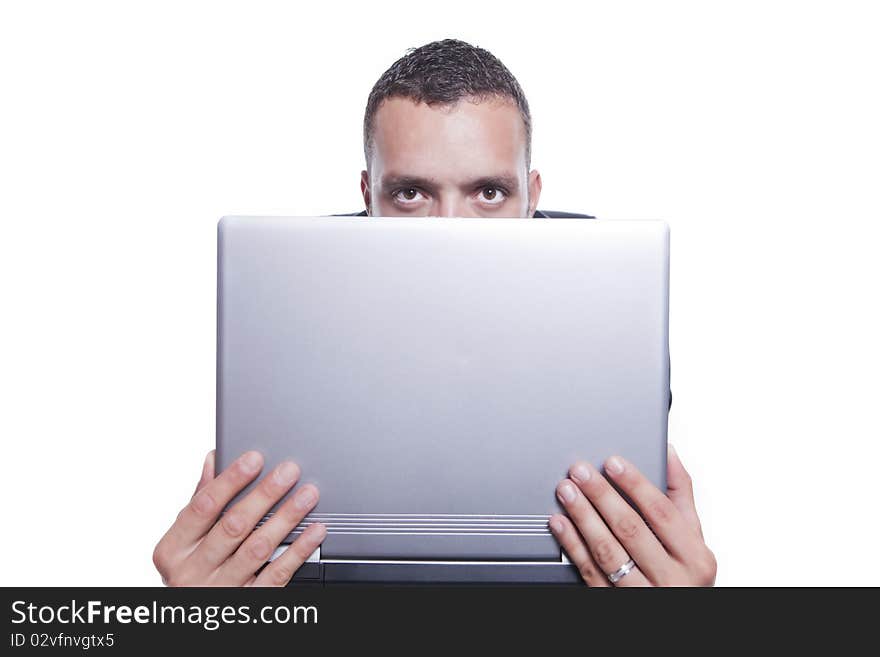 Businessman behind his laptop, isolated on white