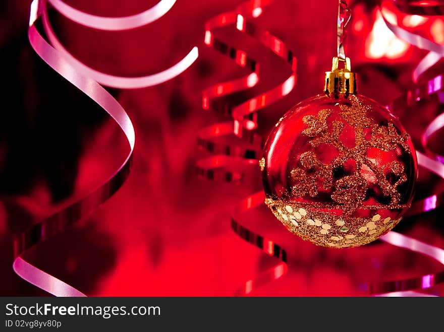 Christmas baubles and ribbons on red background. Christmas baubles and ribbons on red background