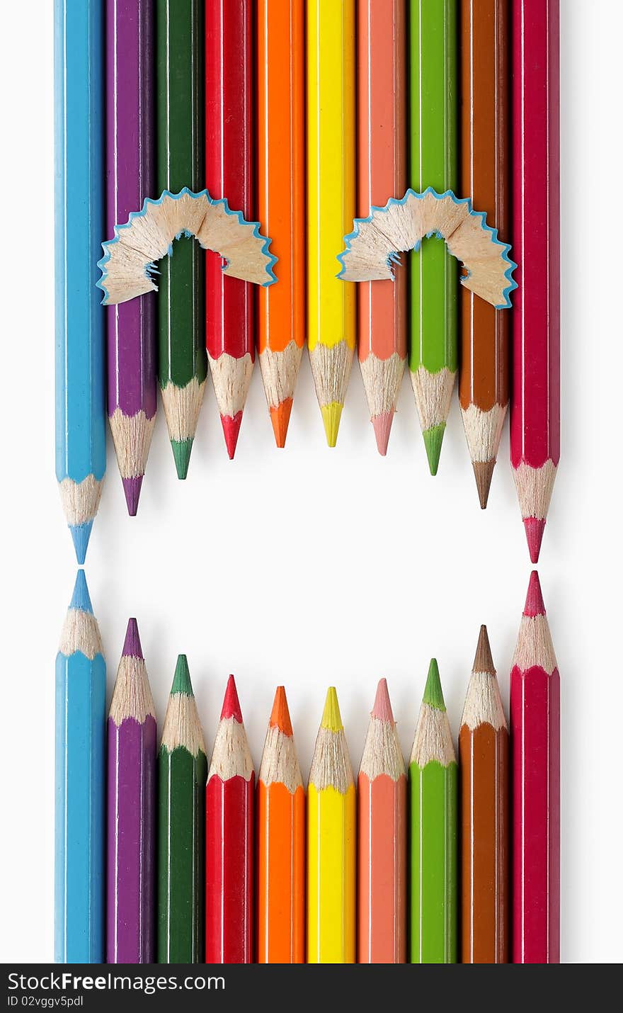 Laughing face of color pencils