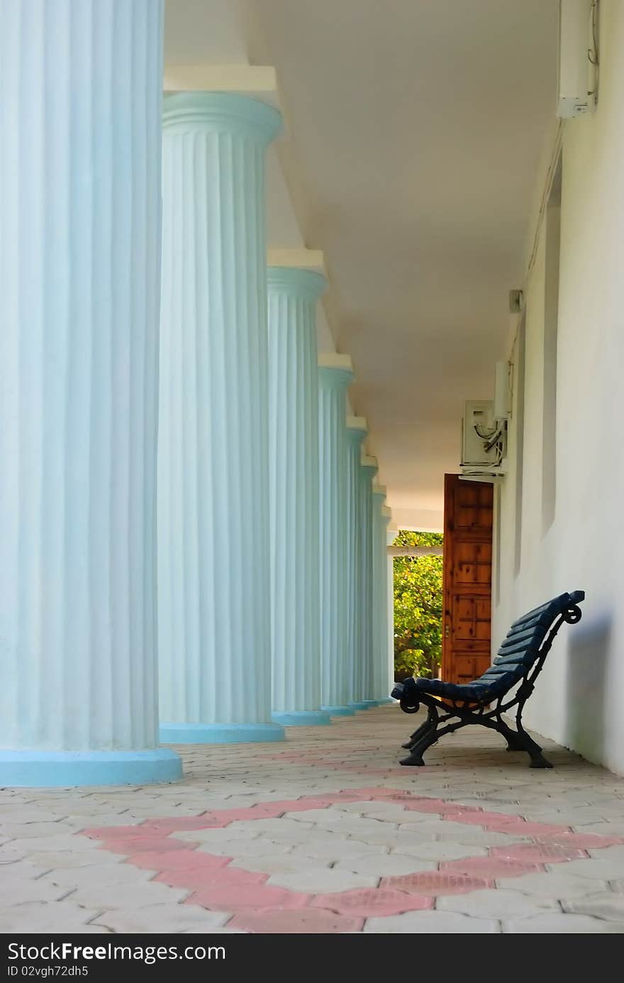 Bench among columns. Old church. Bench among columns. Old church