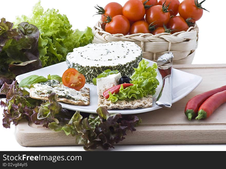 Heathly crackers with cheese, herbs, salad, tomato, olives and peppers. Heathly crackers with cheese, herbs, salad, tomato, olives and peppers