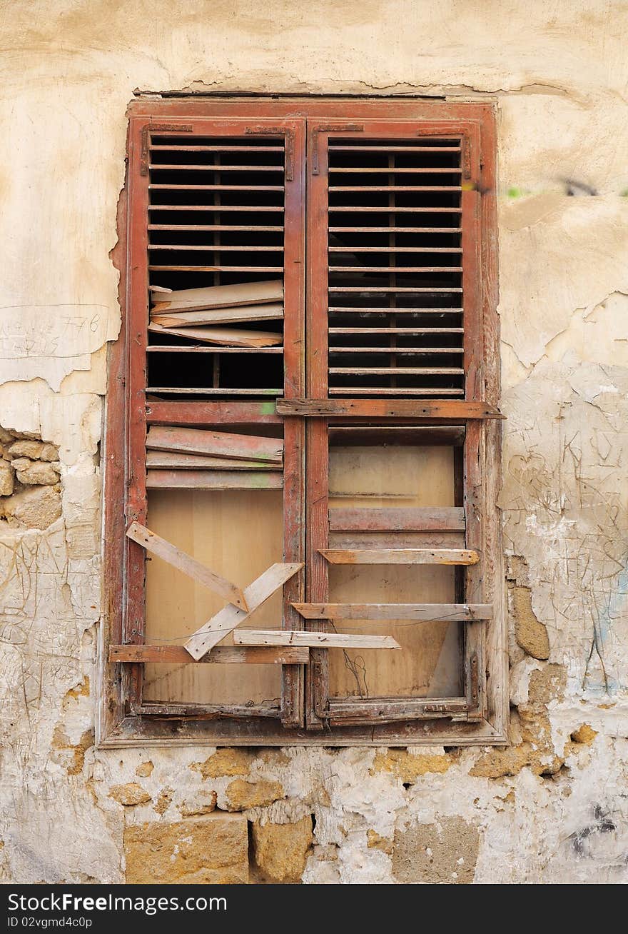 Old wooden broken window