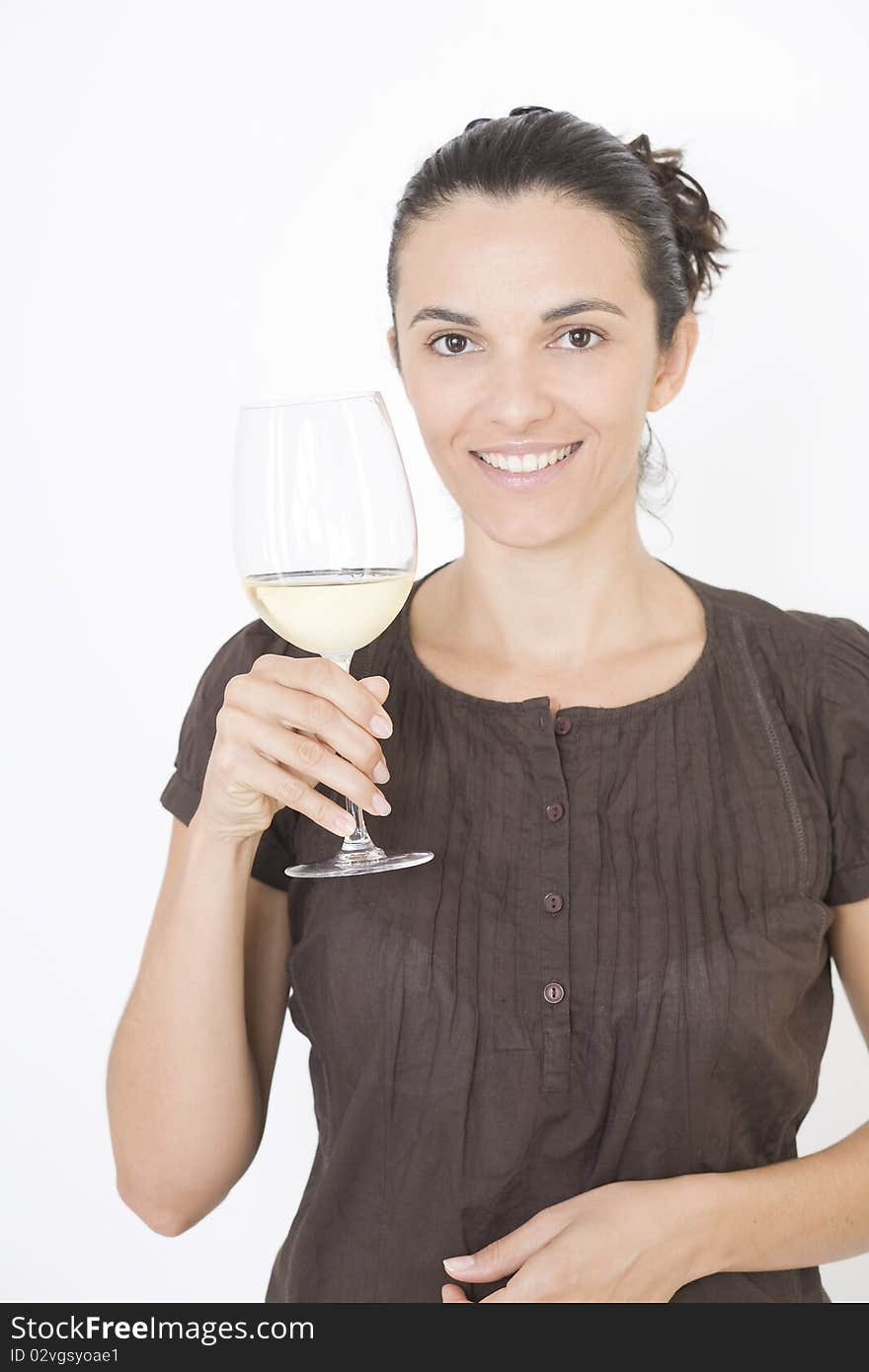 Pretty young woman with white wine