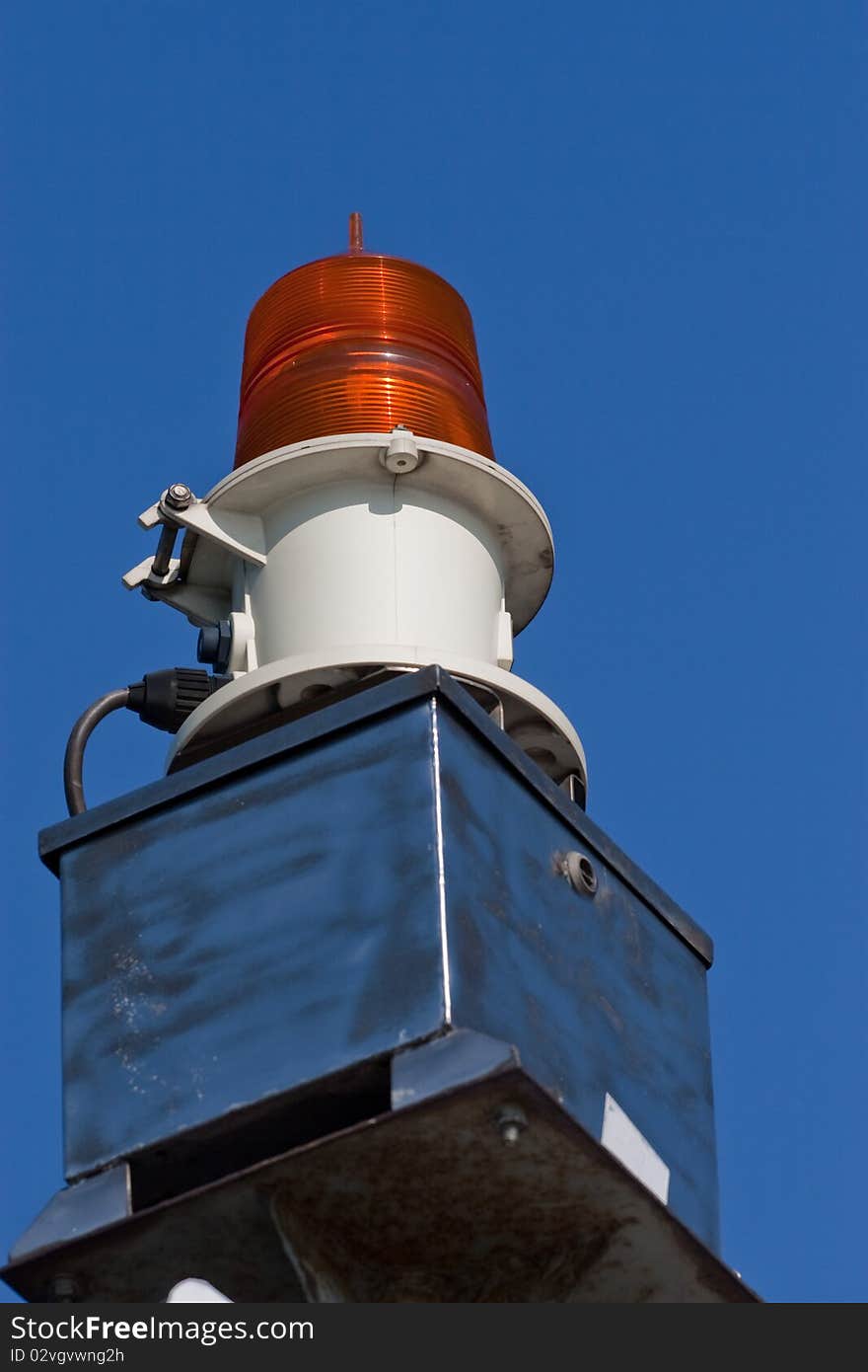 Warning light on the sea shore. Warning light on the sea shore