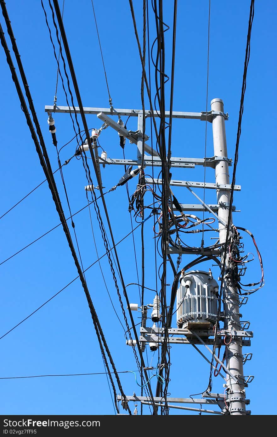 Electric transformer on blue sky