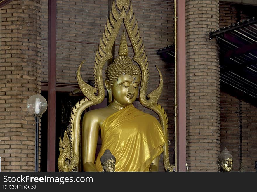 Buddha in hall at Wat Yai Chai mong kol is ancient temple in Ayutthaya , Thailand. Buddha in hall at Wat Yai Chai mong kol is ancient temple in Ayutthaya , Thailand.