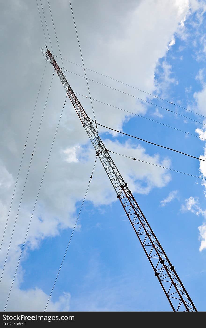 Antenna with blue sky and white cloud