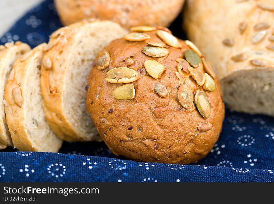 Bread on blue canvas. Macro