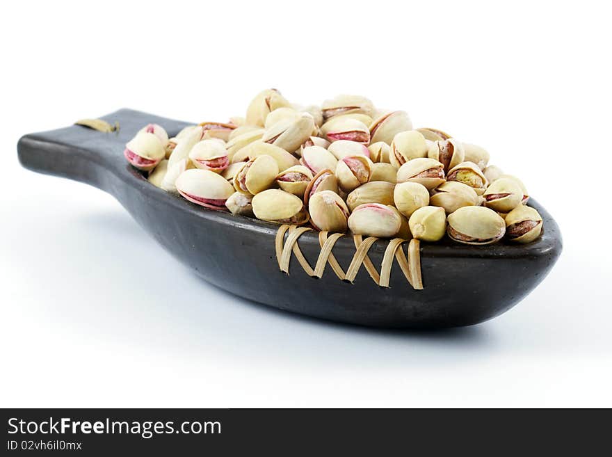 Roasted Pistachio nuts served in a dish