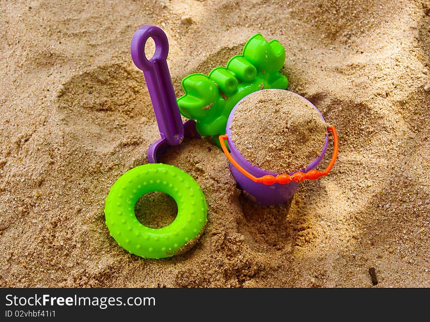 The toys in the sand