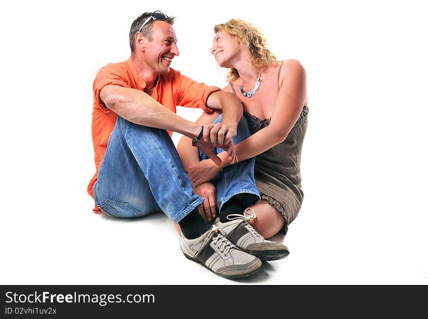 Romantic young couple in front of white background. Romantic young couple in front of white background