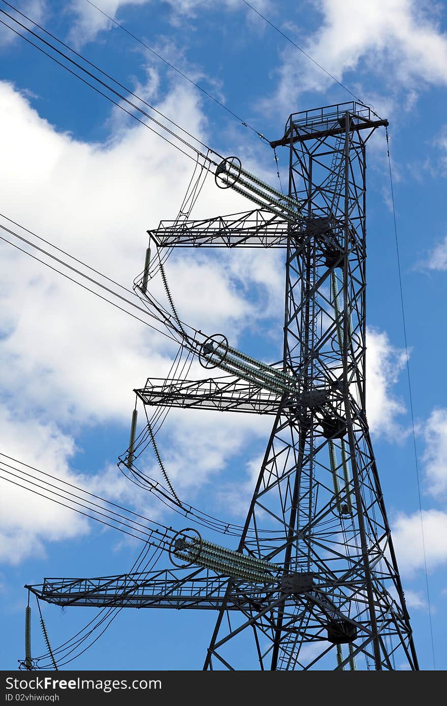 Electrical powerlines on sky background