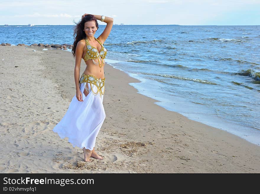 Beautiful woman in white exotic dress. Beautiful woman in white exotic dress