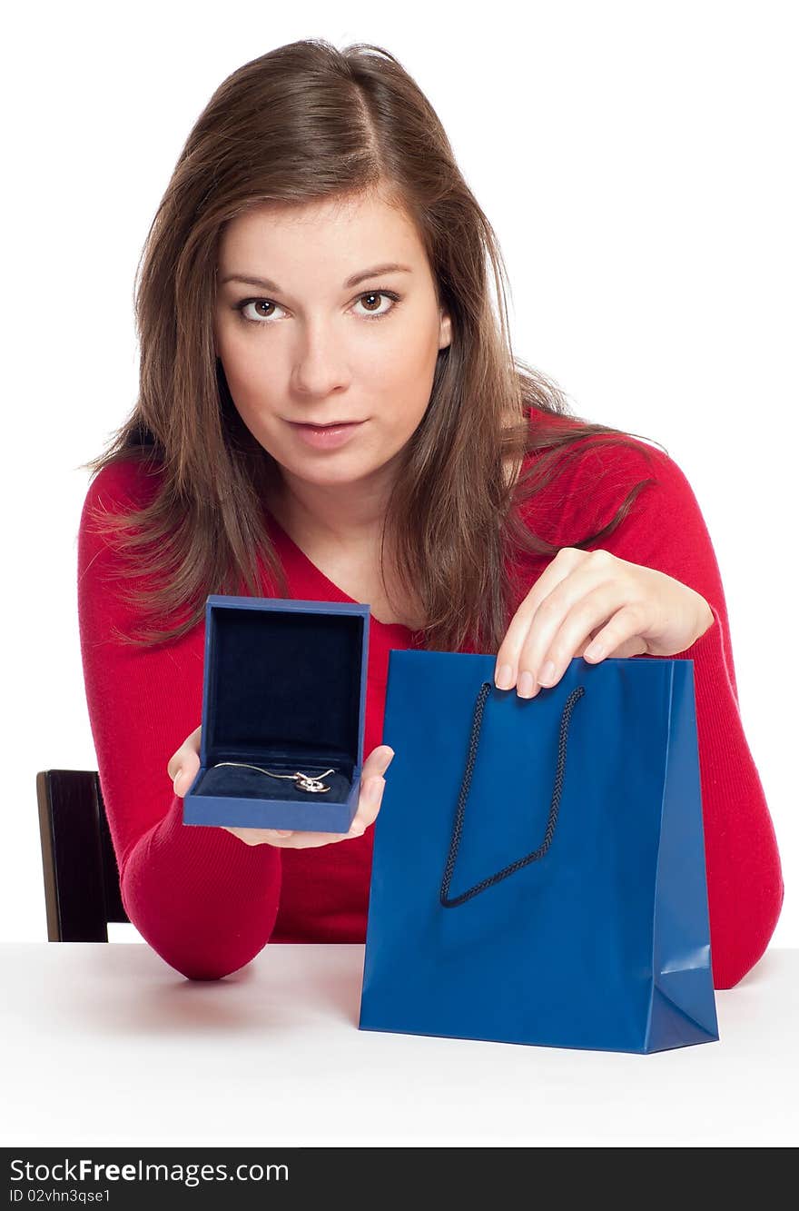 Women holding a luxury jewelry in box with white background