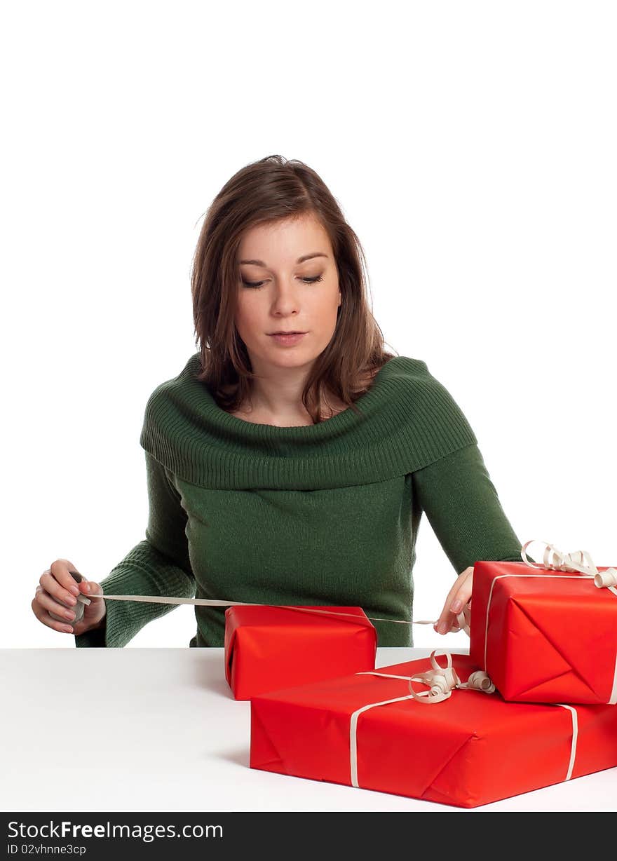 Women wrapping gift box with white background