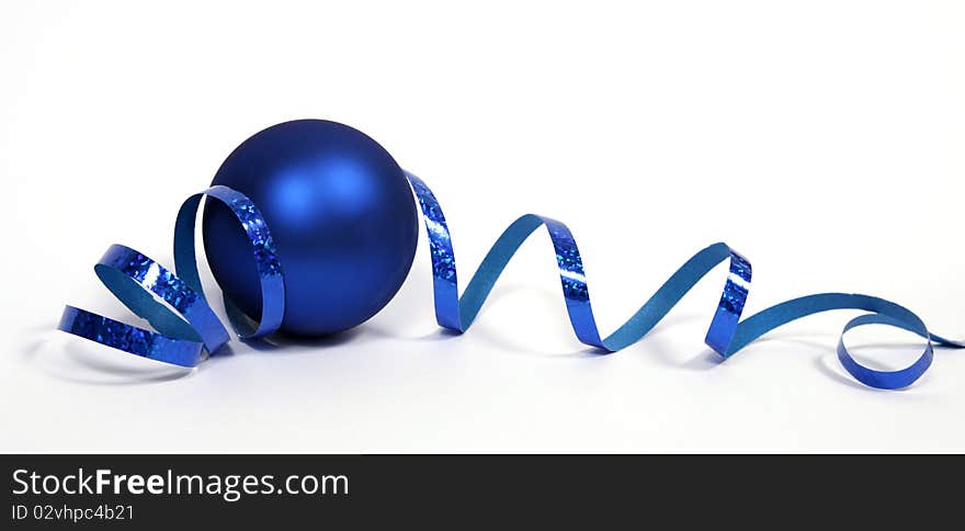 Blue bauble with the blue ribbon on the white background. Blue bauble with the blue ribbon on the white background