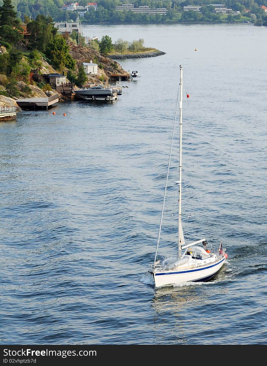 Yacht sailinng past Sweden coastline