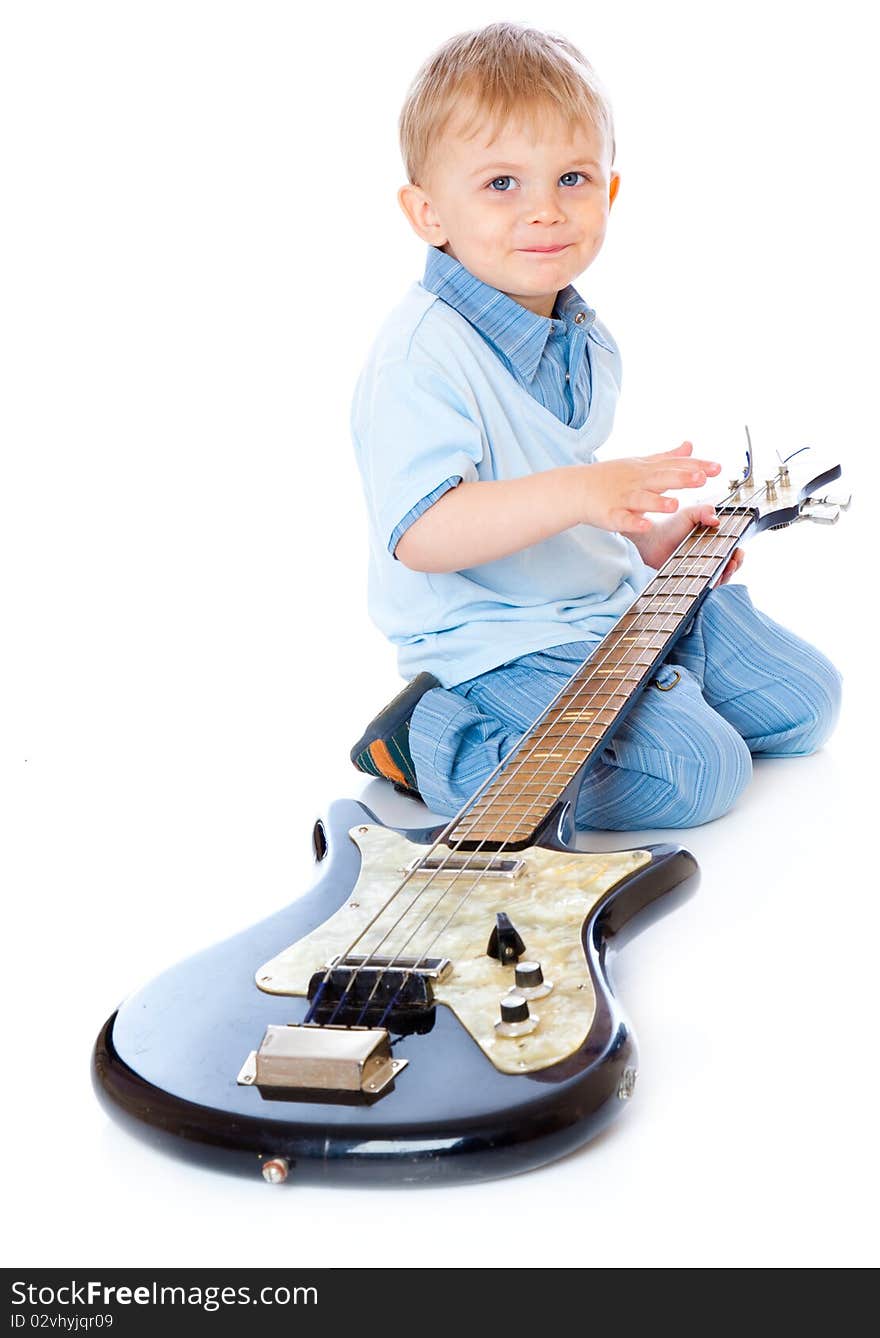 Little boy with guitar