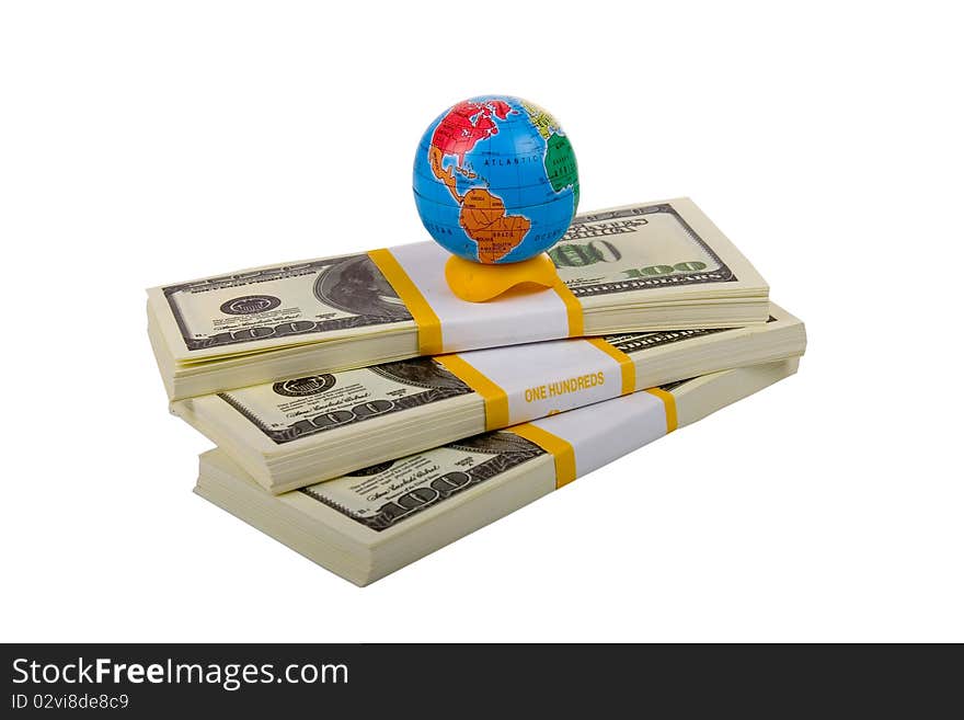 Globe on stacks of dollars isolated on a white background