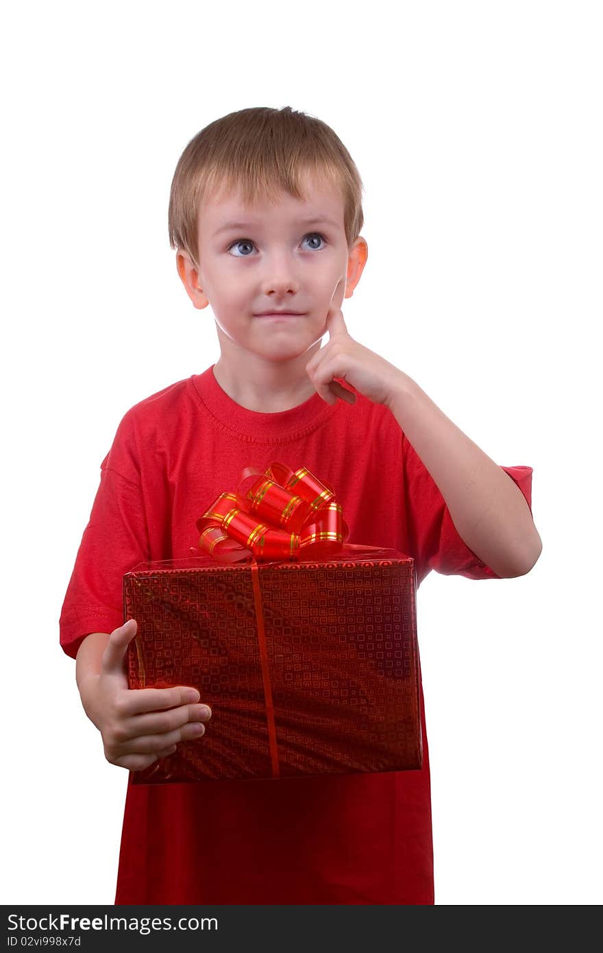 Happy boy thinks about the gift, isolated on a white background