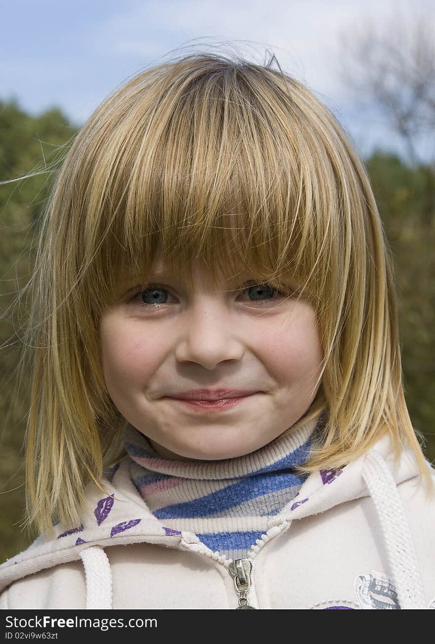 Portrait of face a little happy fun girl. Portrait of face a little happy fun girl