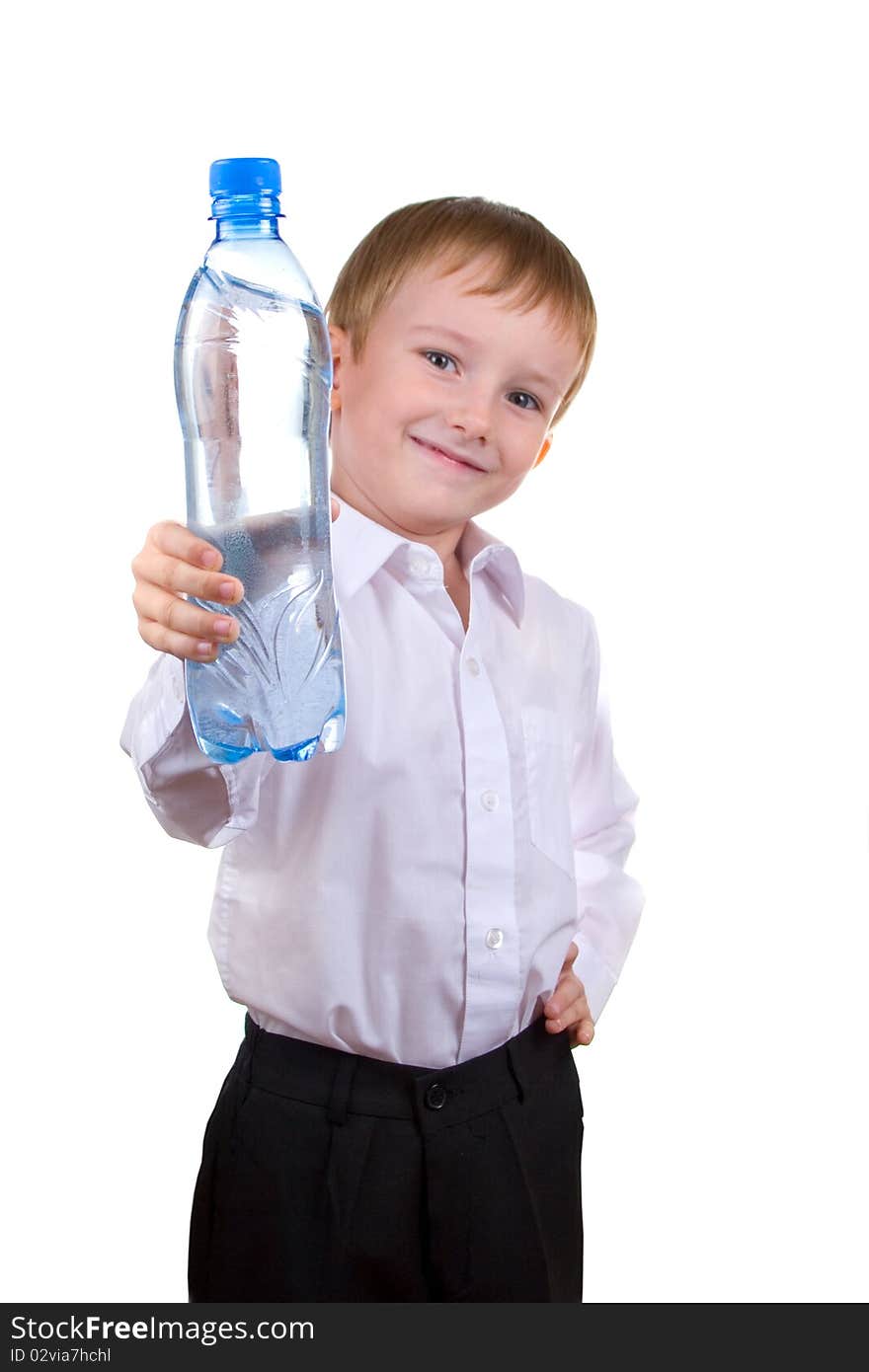 Happy boy with a bottle of water on a white background