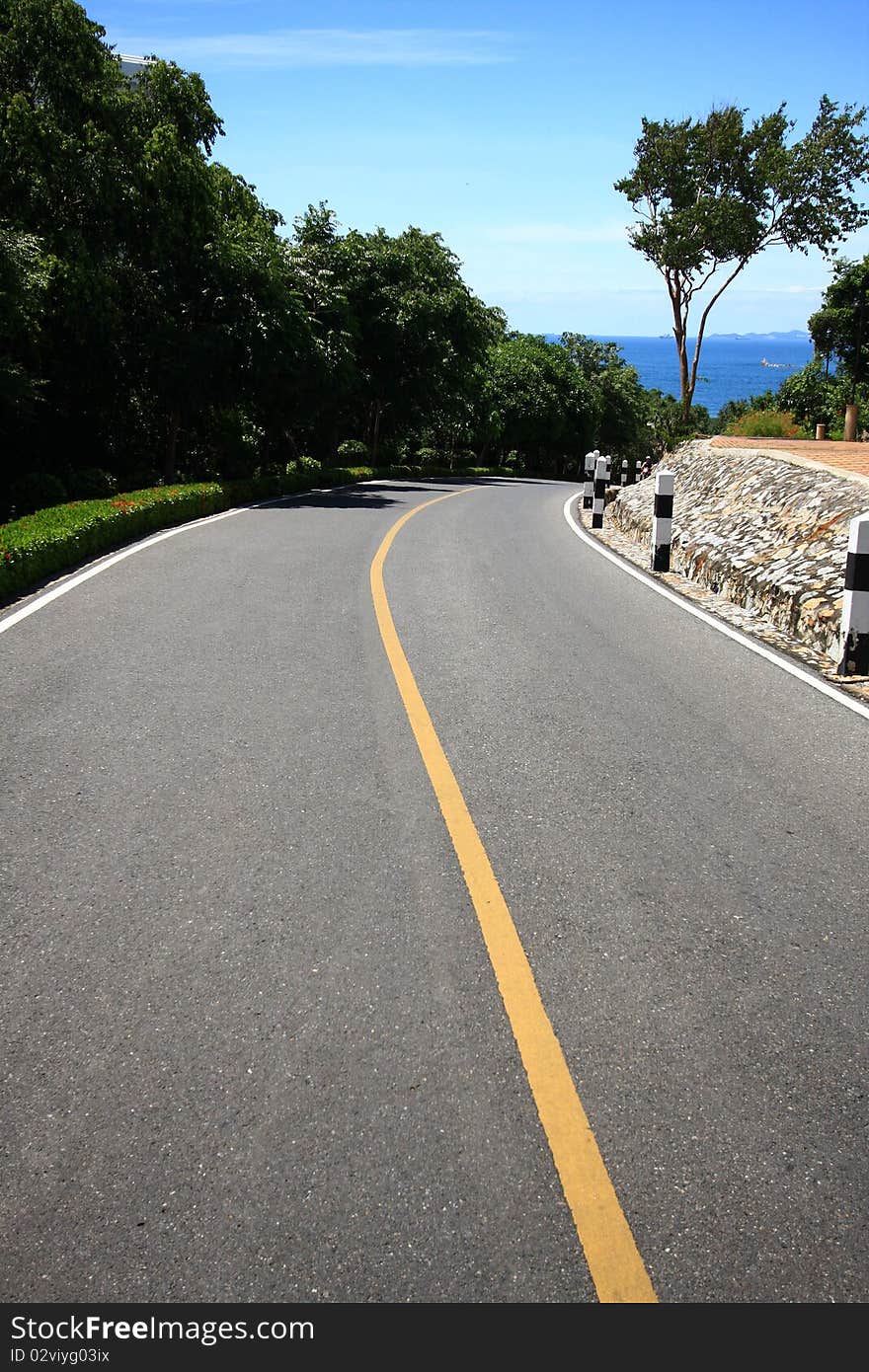 Road on the mountain to the beach. Road on the mountain to the beach