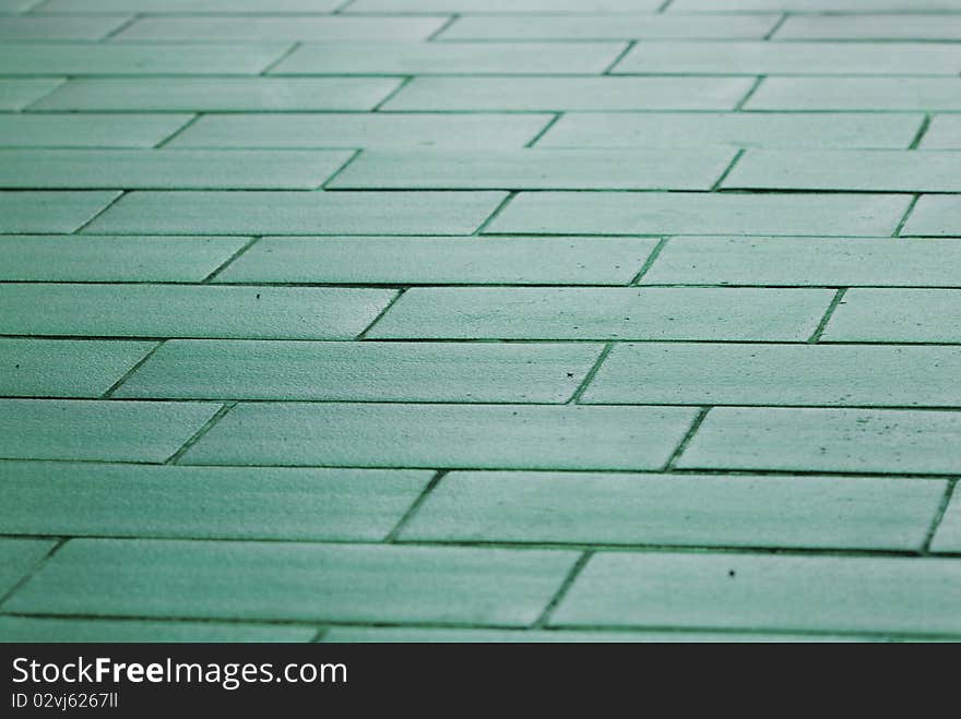 Green floor at resort near beach