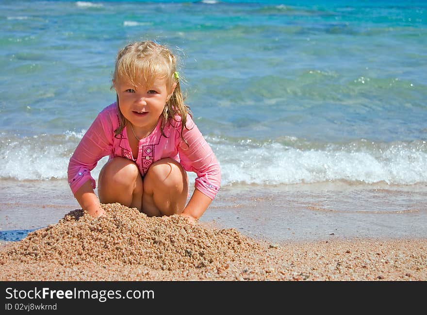 The little girl on seacoast red sea