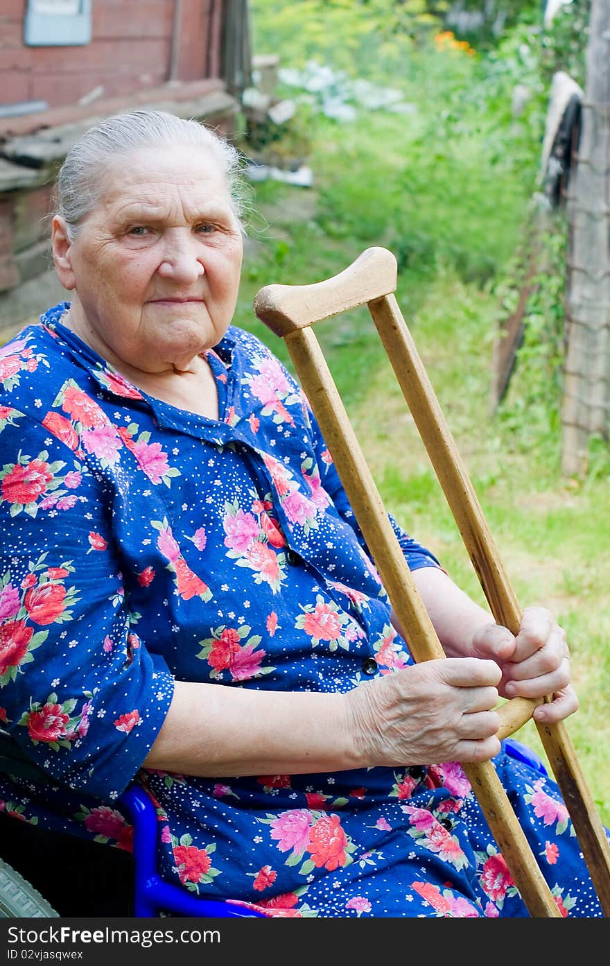 Portrait of the old woman outdoor