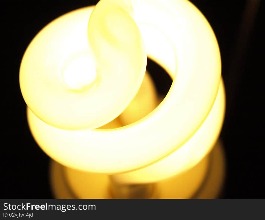 Close up shot of yellow fluorescent light bulb. Close up shot of yellow fluorescent light bulb