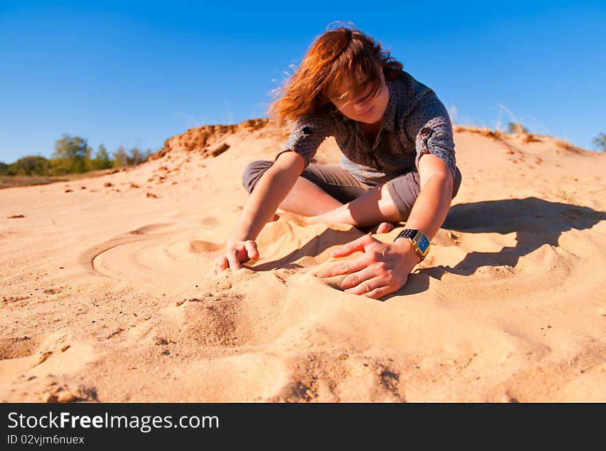 Girl playing with sand