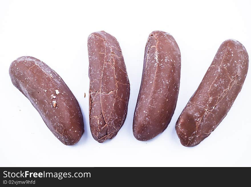 Delicious chocolate pralines over white background.