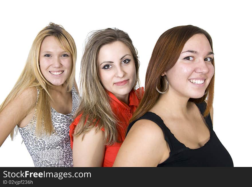 Three girls posing in studio. Three girls posing in studio