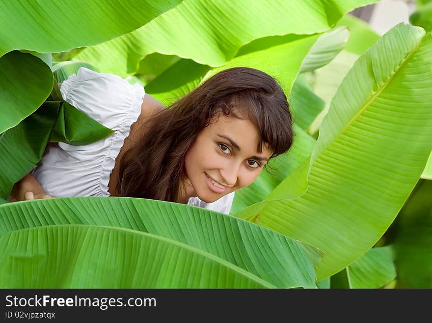 Girl in banana leaves