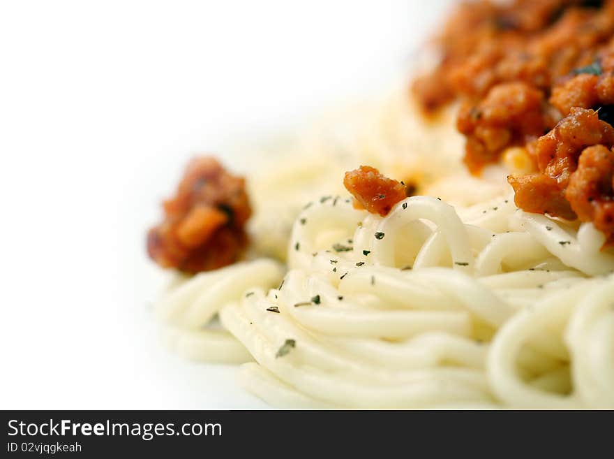 Fresh and tasty pasta with meal on white