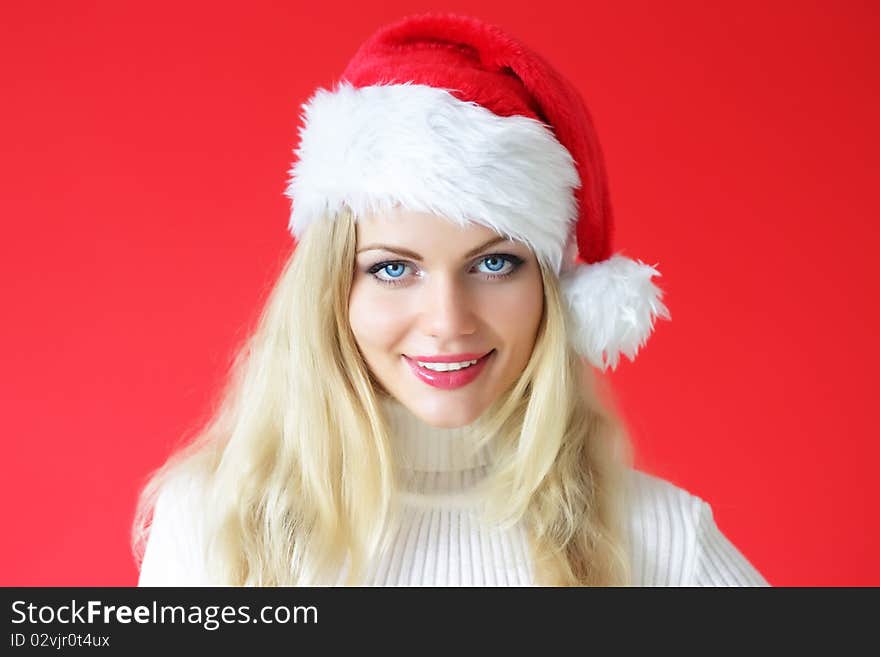 Santa girl on a red background