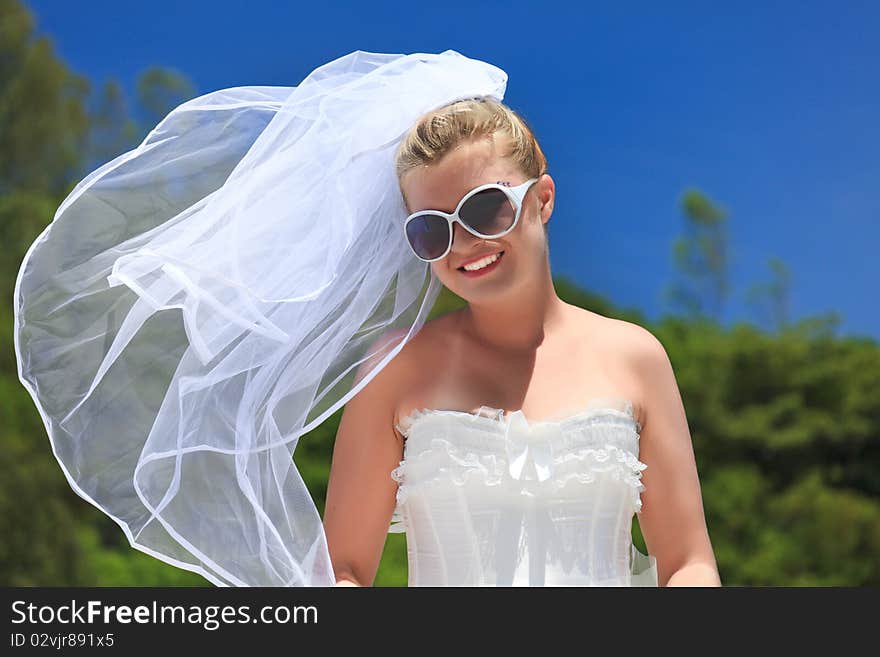 Beautiful young  bride on the tropical beach