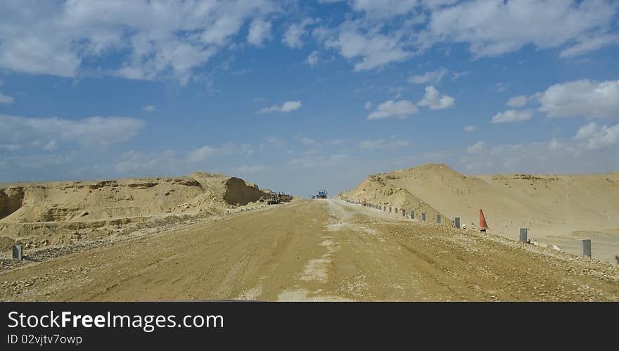 Desert road under construction.