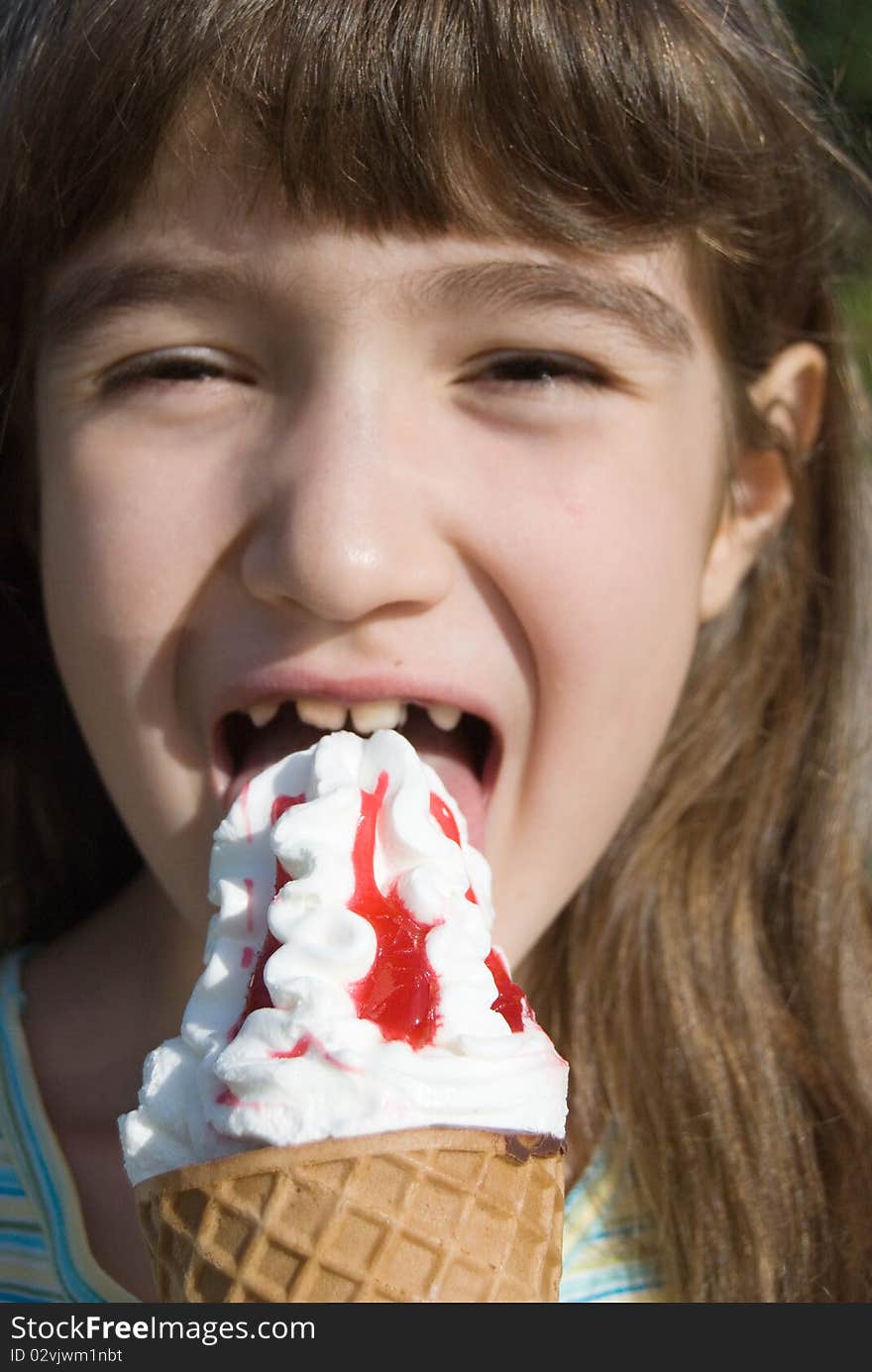 Smiling girl with big ice-cream