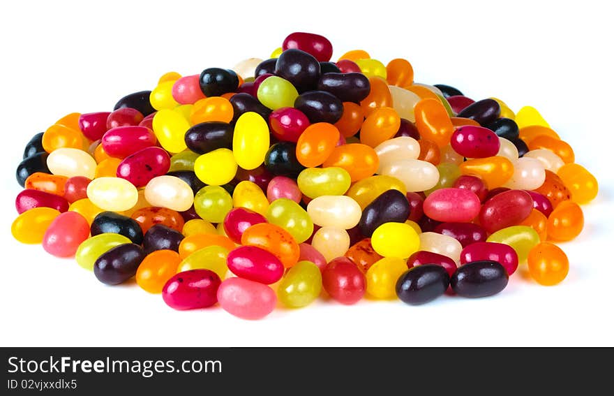A pile of brightly colored bean shaed sweets