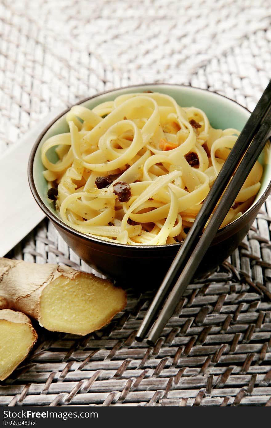 Delicious oriental bowl of noodles and ginger. Delicious oriental bowl of noodles and ginger