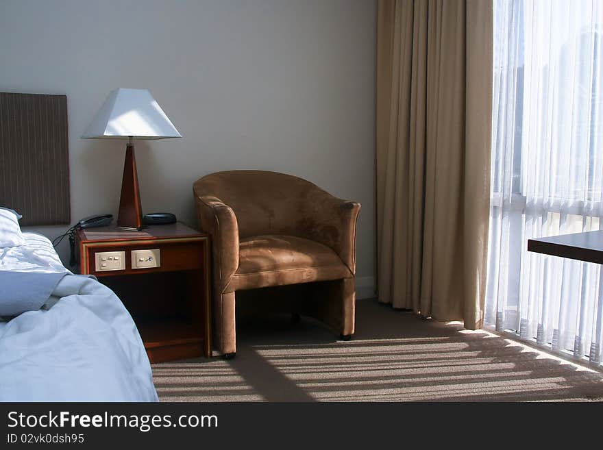 Morning sunlight streaming into hotel room.