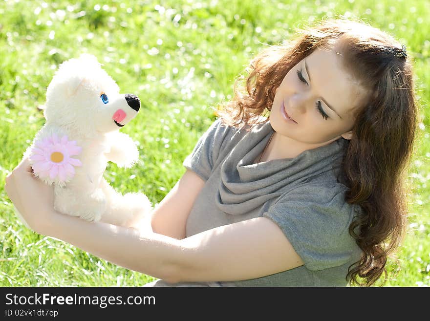 Young girl closeup portret with toy